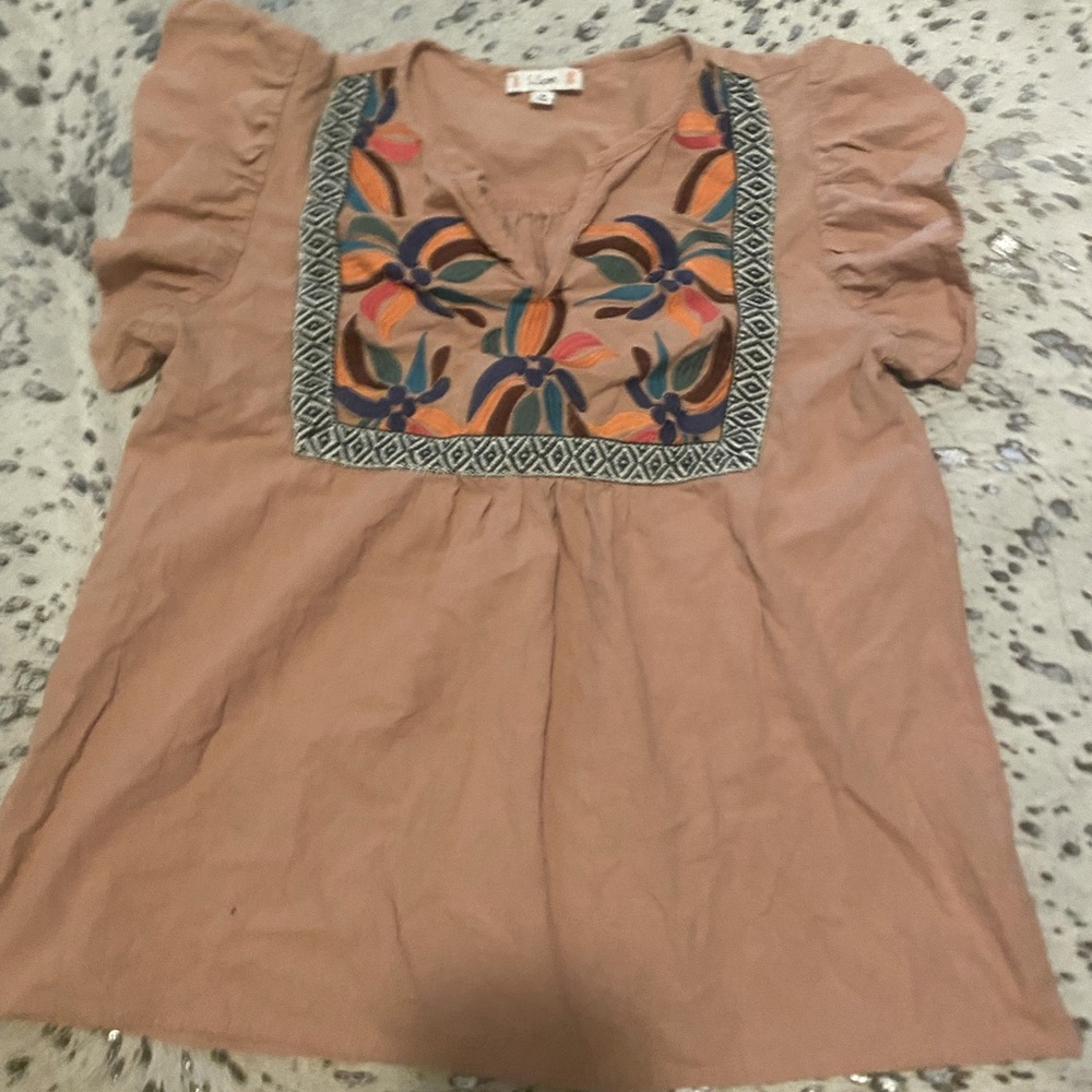 Mauve colored blouse with stitched detailed top